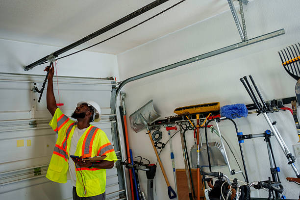 Professional Garage Door Panel Replacement technician working in Winamac, IN